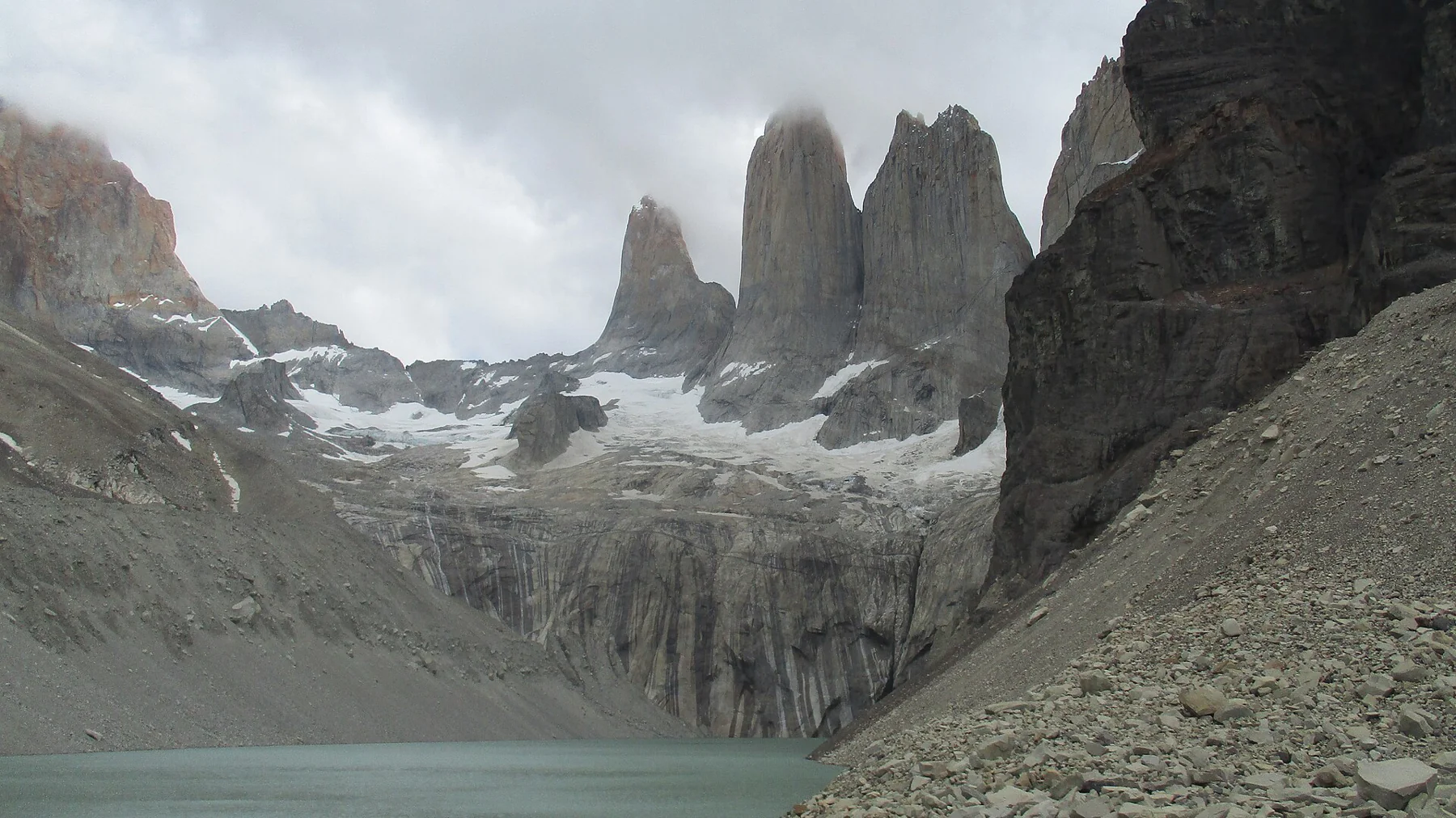 The three granite towers above Laguna de las Torres, seen from Mirador Base Torres in Chile’s Torres del Paine National Park.