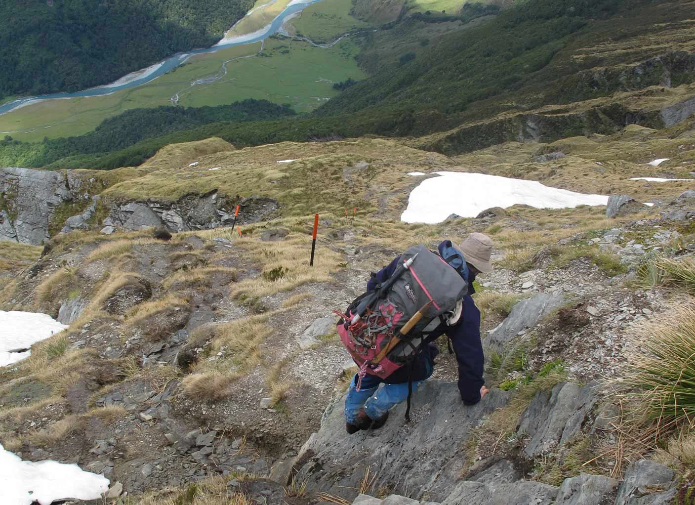 Tramping descending the Cascade Saddle Route into the Matukituki Valley.