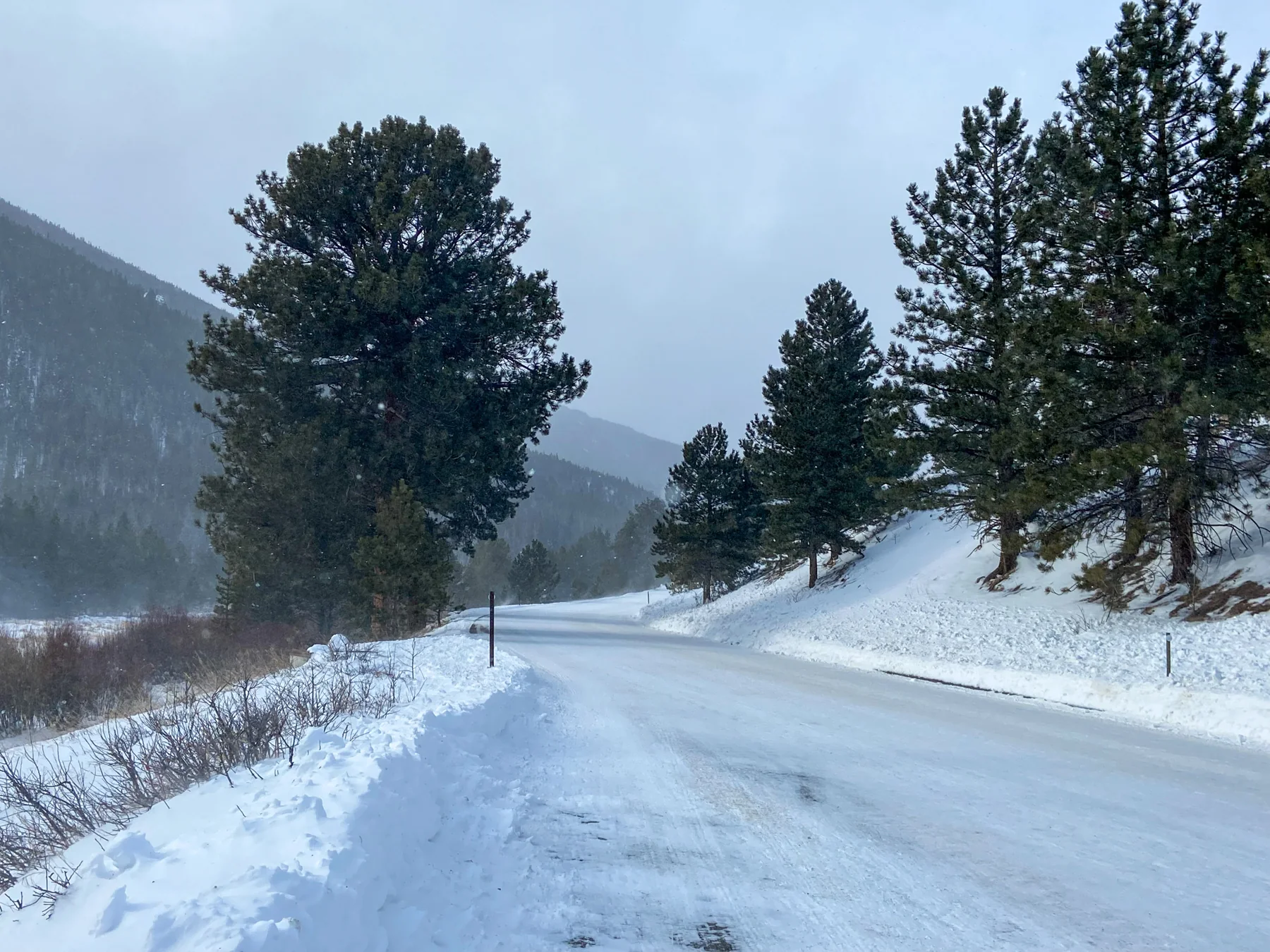 A park road is icy and snowpacked